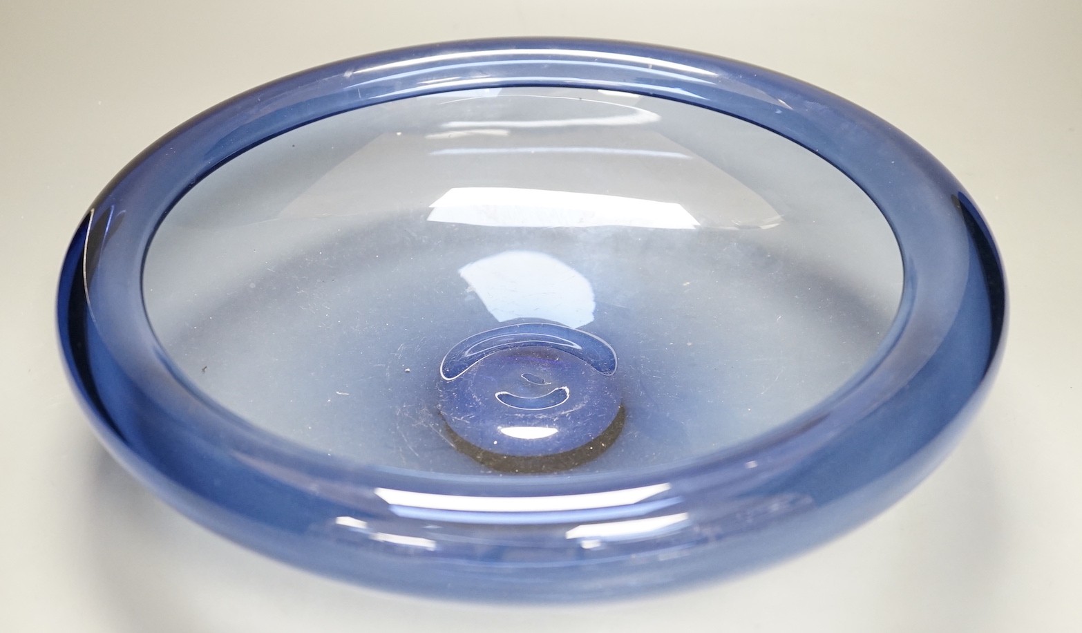 A Holmegaard blue glass bowl, signed and Numbered 17793, 34.5cm